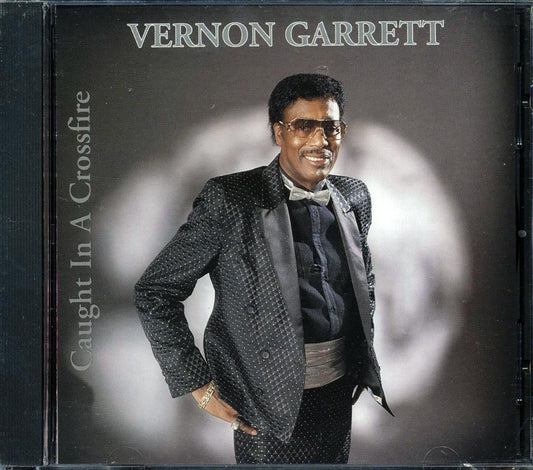 Vernon Garrett - Caught In A Crossfire