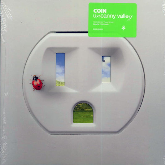 Coin - Uncanny Valley (die-cut jacket)